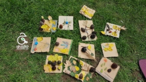 خانواده بزرگ شهید چمران درست کردن تابلو در دل طبیعت